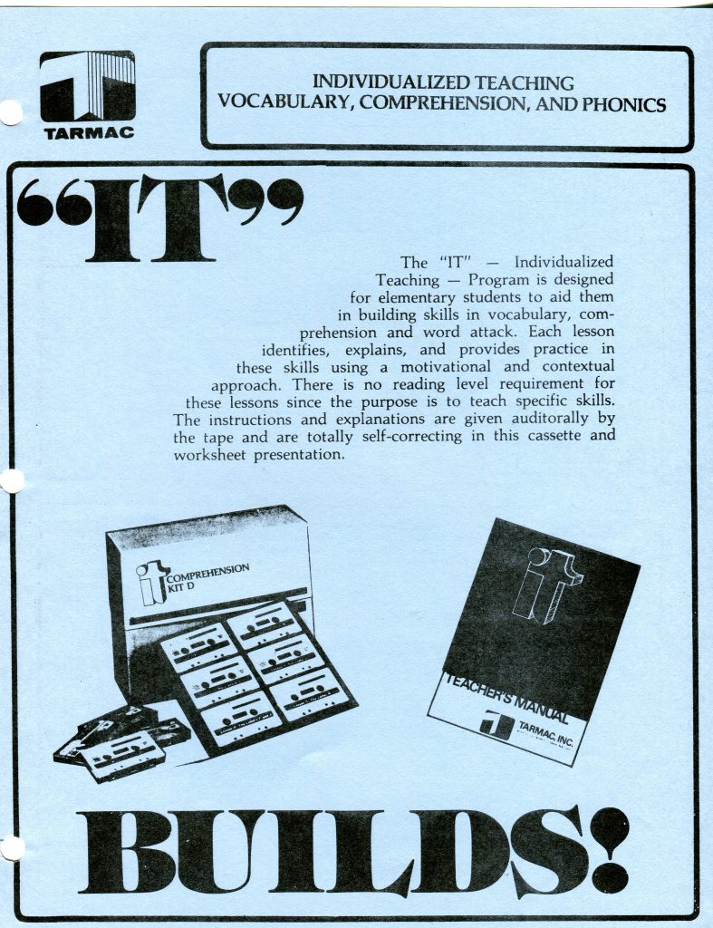 This is a document scan about an educational program called IT, Individualized Teaching, for vocabulary, comprehension, and phonics. The light blue page shows the TARMAC logo at top left and a boxed heading. Large quoted letters IT appear on the left. A paragraph explains the program for elementary students using audio tapes and worksheets, self correcting and contextual. At the bottom are grayscale illustrations of a Comprehension Kit D box with cassette tapes and a Teachers Manual booklet. Three ring binder holes run down the left margin. The word BUILDS! appears large at the bottom.